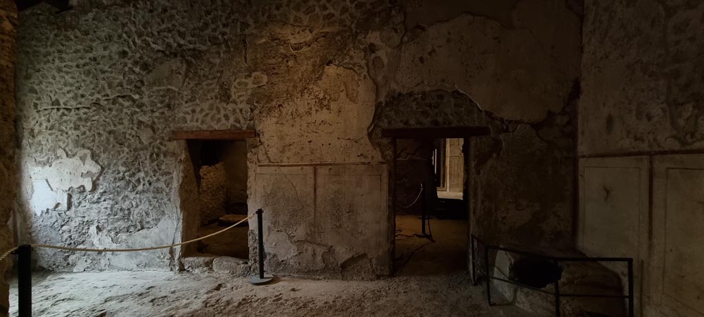 II.9.3 Pompeii. December 2023.
Room 11, looking towards north wall of atrium, with doorway to room 13, centre left, and room 10, centre right. Photo courtesy of Miriam Colomer.