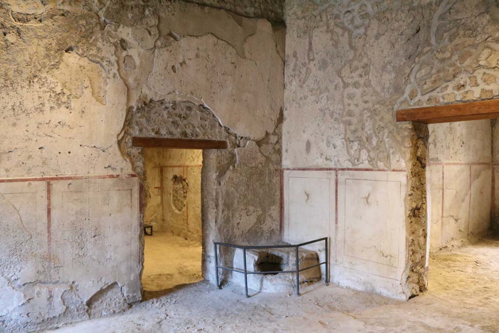 II.9.3 Pompeii. December 2018. Room 11, atrium, looking towards north-east corner with well. 
The doorway to room 10 is on the left, the doorway to room 14 is on the right. Photo courtesy of Aude Durand.