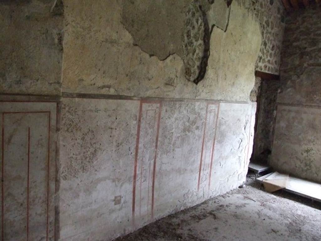 II.9.4 Pompeii. December 2007. Room 5, north wall, with doorway to room 6, a cubiculum, on right.