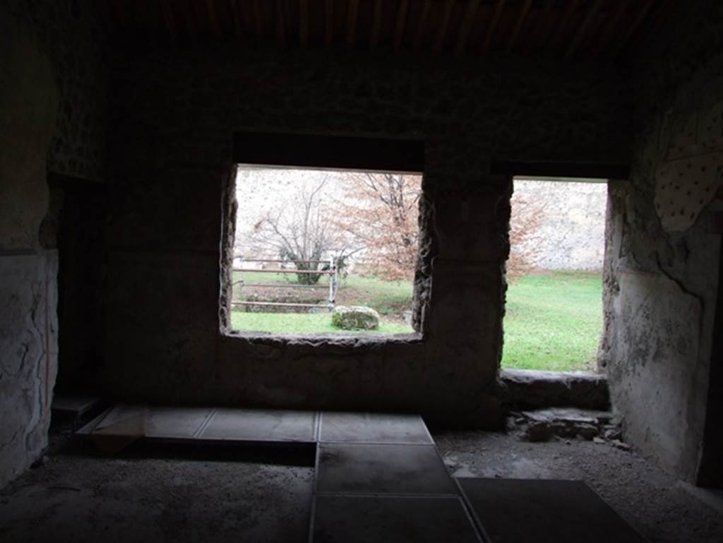 II.9.4 Pompeii. December 2007. 
Room 5, looking east with window overlooking garden and doorway to garden at rear of house.