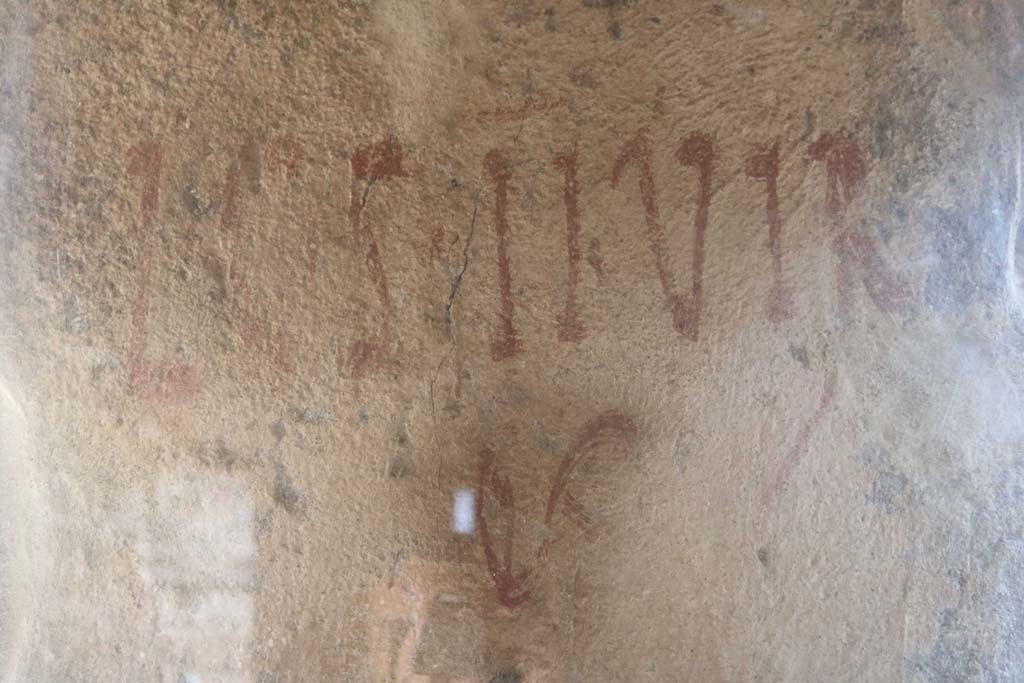 II.9.4 Pompeii. December 2018. 
Room 5, electoral inscription on plaster on inside wall pillar between window and door to garden, reading - 
L C S II VIR.
Photo courtesy of Aude Durand.