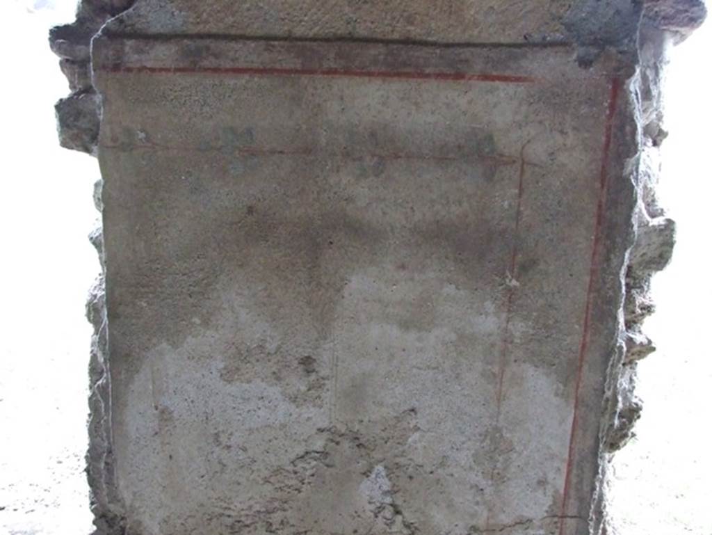 II.9.4 Pompeii. December 2007. Room 5, lower part of inside wall pillar between window and door to garden..