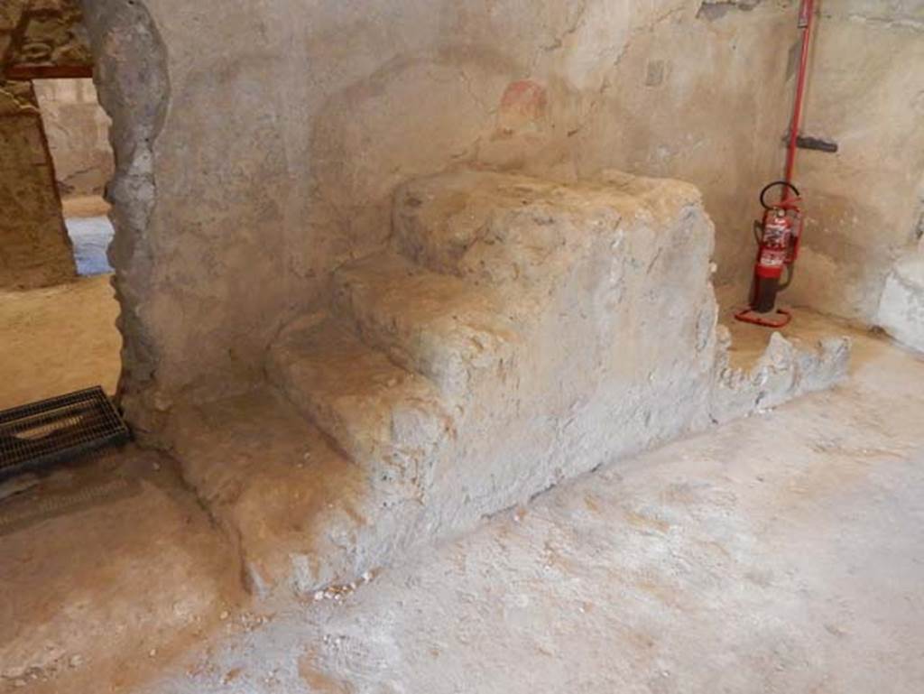 II.9.4, Pompeii. May 2018. 
Room 2, steps to upper floor against south wall of the atrium, with linking doorway to room 10, in II.9.3, on left. 
Photo courtesy of Buzz Ferebee.