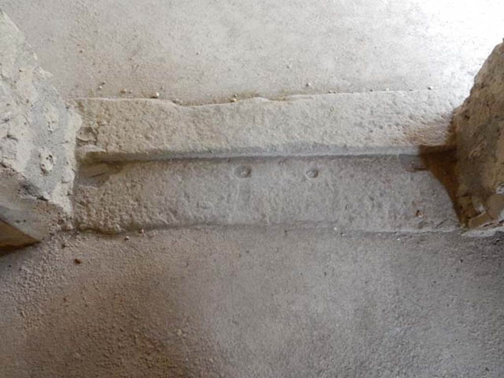 II.9.4, Pompeii. May 2018. Room 8, doorway threshold leading up into room 5. Photo courtesy of Buzz Ferebee.