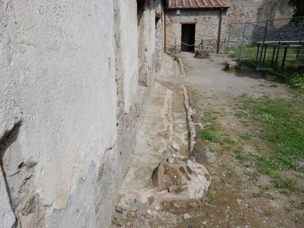 II.9.4, Pompeii. May 2018. Looking north along gutter near west garden/house wall. Photo courtesy of Buzz Ferebee.