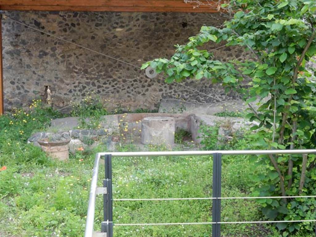 II.9.4 Pompeii. May 2018. Looking east to triclinium against rear wall in garden area 9. Photo courtesy of Buzz Ferebee.