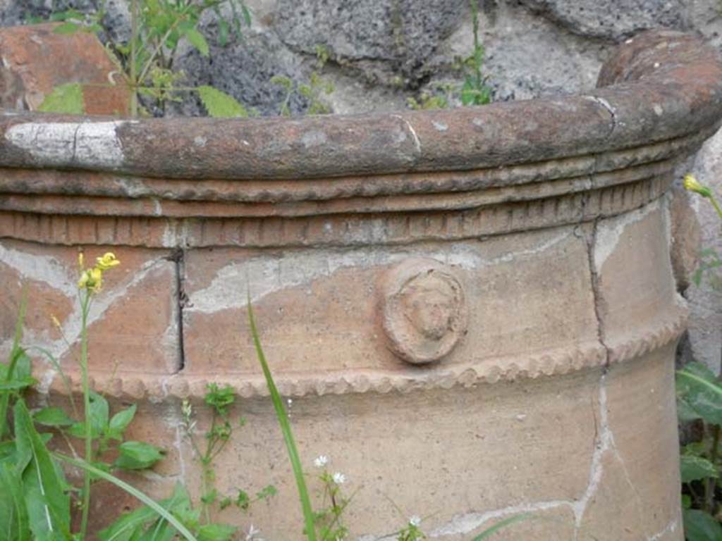 II.9.4, Pompeii. May 2018. Detail of terracotta puteal. Photo courtesy of Buzz Ferebee.