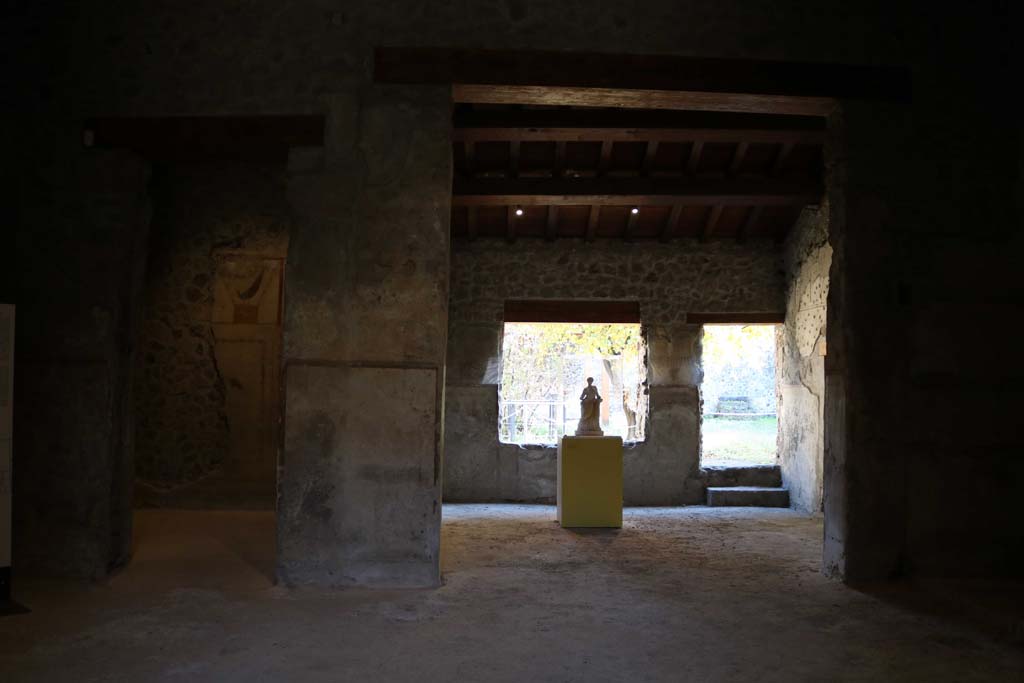 II.9.4 Pompeii. December 2018. 
Looking east across room 2 atrium, towards doorway to room 4 in north-east corner of atrium, on left. Room 5 is on the right.
Photo courtesy of Aude Durand.