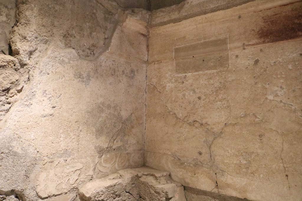 II.9.5 Pompeii. December 2018. 
Room 5, looking towards south wall and south-west corner with remaining stucco. Photo courtesy of Aude Durand.