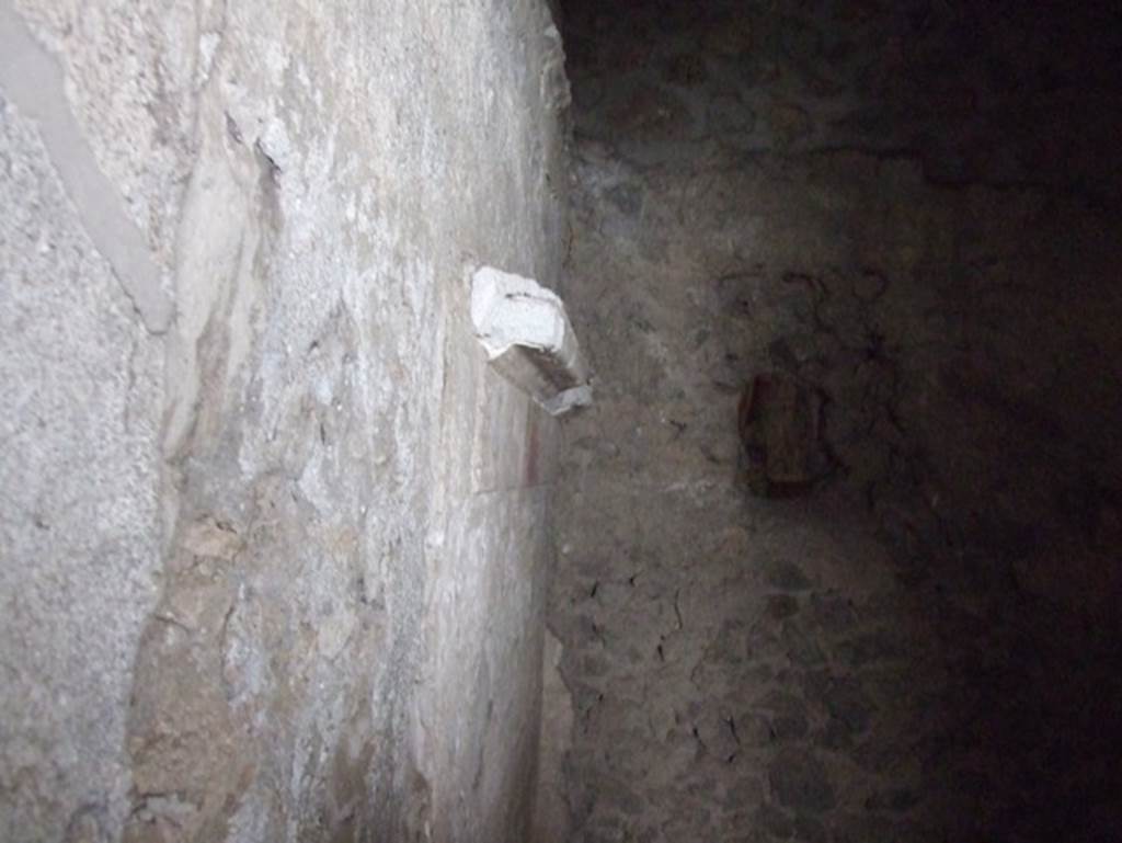 II.9.5 Pompeii. December 2007. Room 5, plasterwork on north wall in north-east corner.