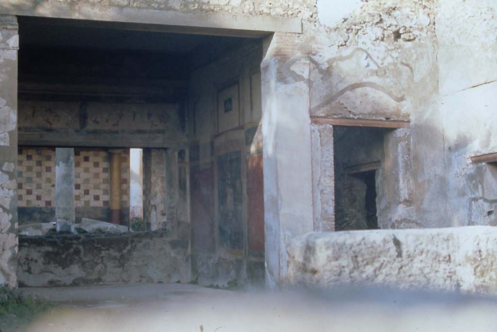III.2.1 Pompeii. 4th December 1971. Looking across atrium towards north-east corner of tablinum and east wall. 
Photo courtesy of Rick Bauer, from Dr.George Fay’s slides collection.