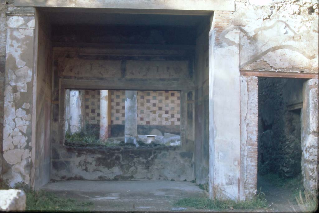 III.2.1 Pompeii, 4th December 1971. 
Looking north across atrium towards tablinum, and doorway to rear corridor and peristyle, on right.
Photo courtesy of Rick Bauer, from Dr.George Fay’s slides collection.