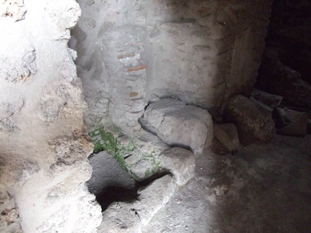 III.2.1 Pompeii. March 2009. Room 11, looking through doorway towards north wall.
In the north-west corner, centre left, is the fusorium and next to it, in centre, is the praefurnium above which can be seen the impression of the boiler.
See Berg, R. (2008). Interventi di scavo e saggi stratigrafici nella Casa diAulo Trebio Valente, in Rivista di Studi Pompeiani, XIX, 2008, (p.109).