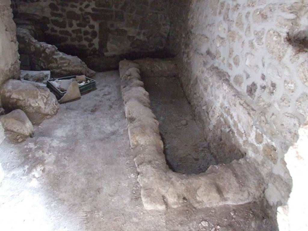 III.2.1 Pompeii. March 2009. 
Room 11, looking towards the south-east corner and south wall with remains of hearth/bench.