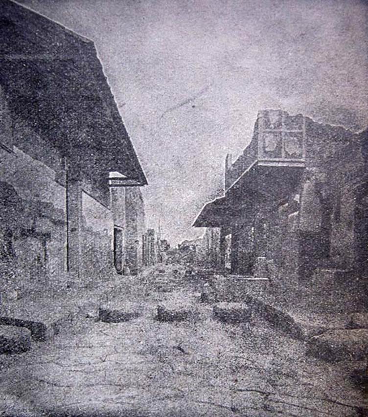 III.2.1 Pompeii on the left. 
Early 20th century photograph, looking east along Via dell’Abbondanza. Photo courtesy of Paolo Tatafiore.