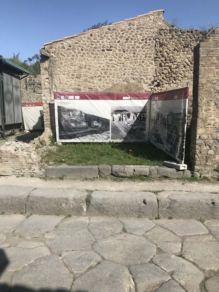 III.4.1 Pompeii, on right. Vicolo di Ifigenia, on left. April 2019. Looking north towards entrance threshold. 
The west wall, on left, has not been restored. Photo courtesy of Rick Bauer.