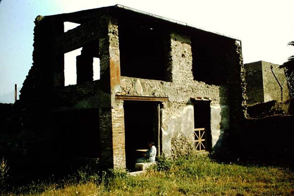 III.4.3 Pompeii. 1957. Looking south-west towards triclinium and upper floor, with Tatiana Warscher sitting in doorway. Photo by Stanley A. Jashemski.
Source: The Wilhelmina and Stanley A. Jashemski archive in the University of Maryland Library, Special Collections (See collection page) and made available under the Creative Commons Attribution-Non Commercial License v.4. See Licence and use details.
J57f0253