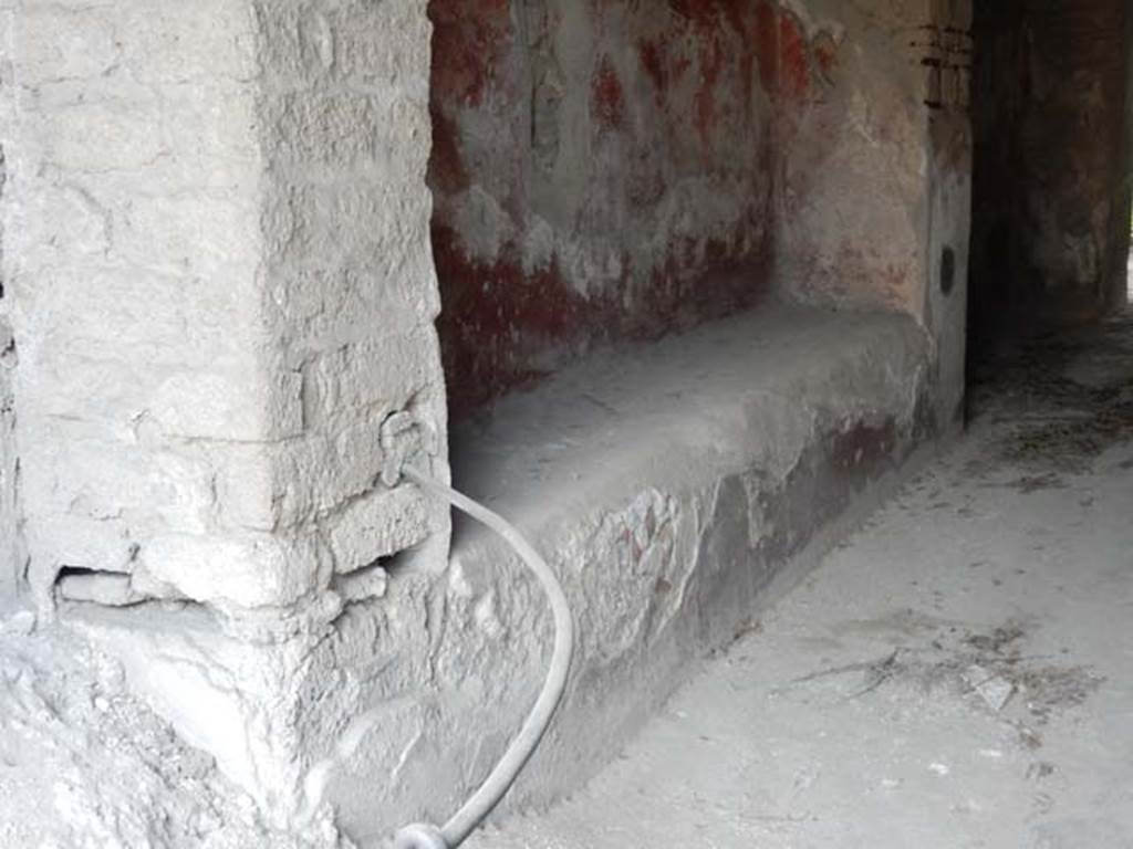 III.4.3 Pompeii. May 2017. Room 1, detail of bench or counter against west wall of entrance corridor. Photo courtesy of Buzz Ferebee.