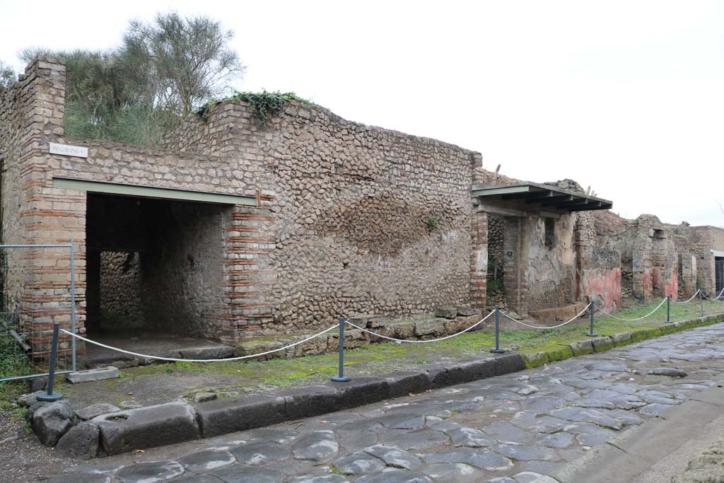 III.5.1 Pompeii, on left. December 2018. 
Looking east along insula III.5, from III.5.1 towards III.5.5, on right. Photo courtesy of Aude Durand.