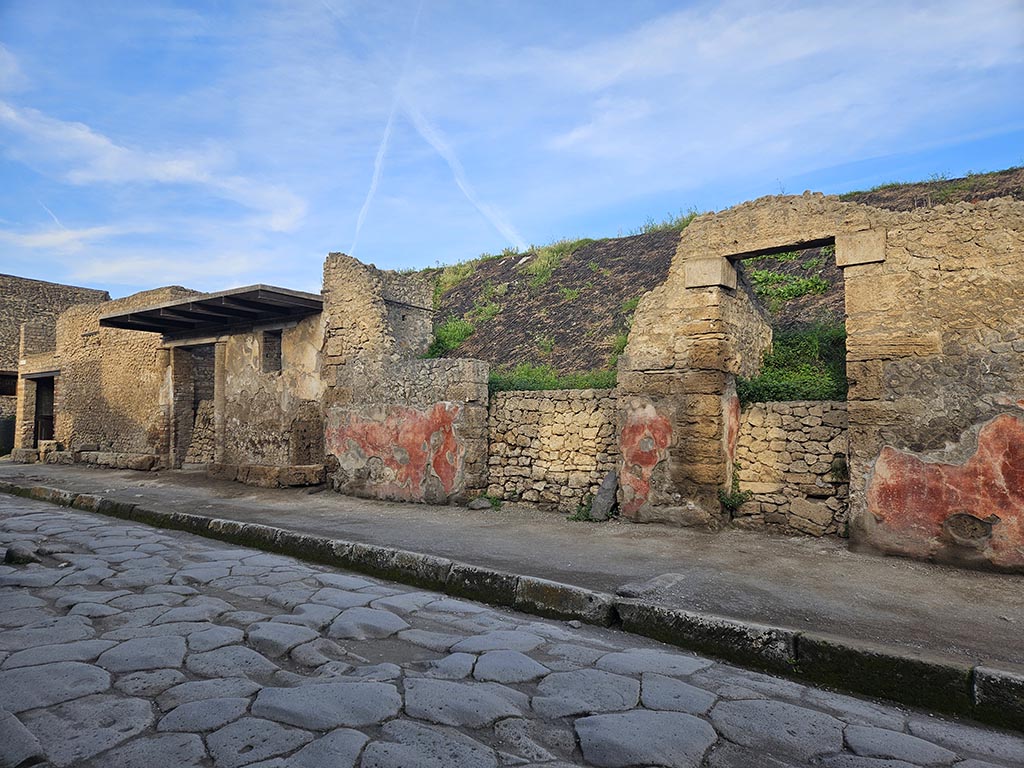 III.5.4 Pompeii, on right. November 2024. 
Looking west along north side of Via dell’Abbondanza, from III.5.1 on left, to III.5.4 on right. Photo courtesy of Annette Haug.