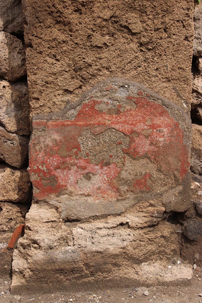 III.6.5 Pompeii. May 2024. 
Detail from lower pilaster on east side of doorway. Photo courtesy of Klaus Heese.