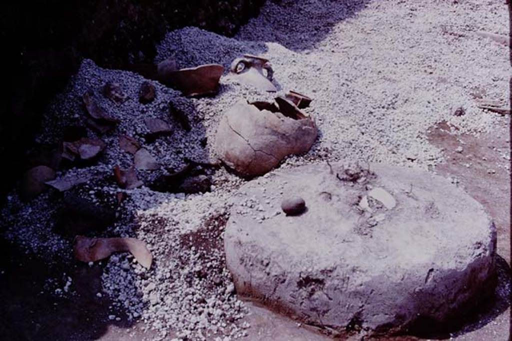 III.7 Pompeii. 1976. Objects emerging from the lapilli. Photo by Stanley A. Jashemski.   
Source: The Wilhelmina and Stanley A. Jashemski archive in the University of Maryland Library, Special Collections (See collection page) and made available under the Creative Commons Attribution-Non Commercial License v.4. See Licence and use details. J76f0426