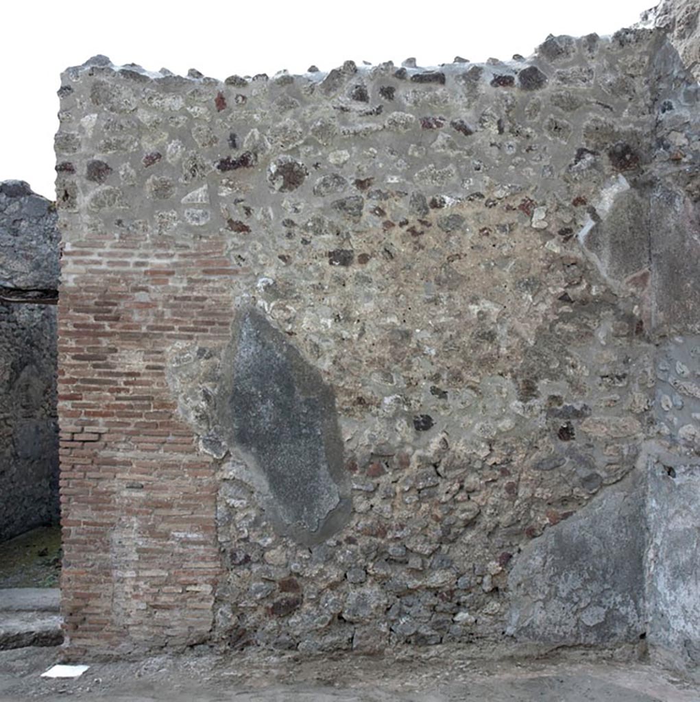 V.1.3 Pompeii. c.2012.
Room “a”, west wall of tablinum. Photo by Hans Thorwid.
“W wall in 2012. Restored parts of the wall photographed and merge with the lower part and floor line of earlier photos from 2005-7.”
Photo and words courtesy of the Swedish Pompeii Project.