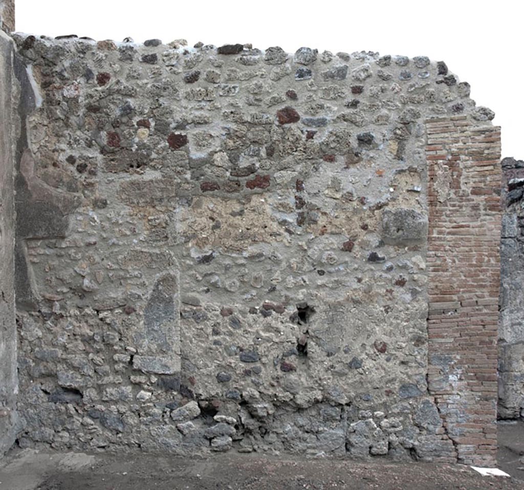 V.1.3 Pompeii. c.2012.
Room “a”, east wall of tablinum. Photo by Hans Thorwid.
“E wall in 2012. Restored parts of the wall photographed and merge with the lower part and floor line of earlier photos from 2005-7.”
Photo and words courtesy of the Swedish Pompeii Project.