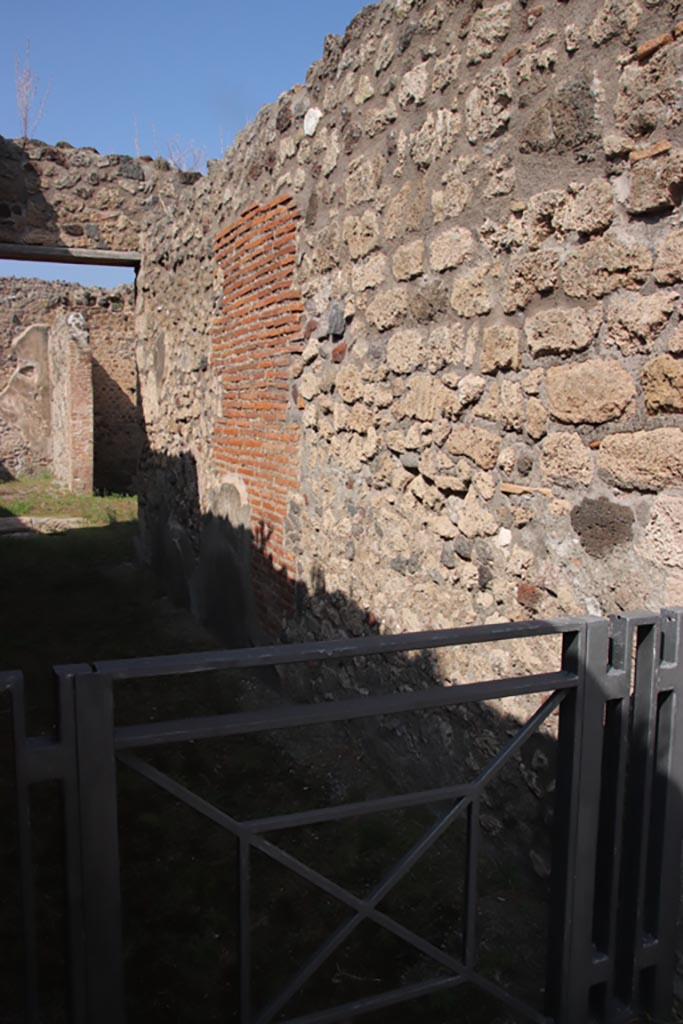 V.1.3 Pompeii. October 2023. 
Looking north along east wall of entrance corridor/fauces. Photo courtesy of Klaus Heese.