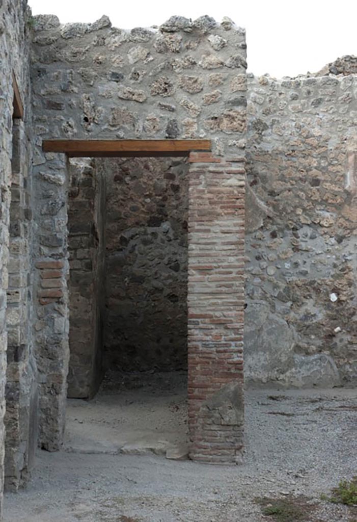 V.1.3 Pompeii. c.2012. 
Room 2, north-west corner of north wall of atrium, doorway to room “b”, after restoration.
Photo by Hans Thorwid.
Photo courtesy of the Swedish Pompeii Project.