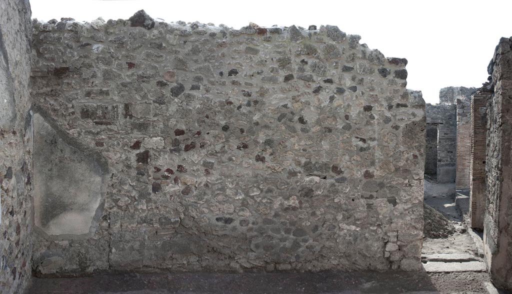 V.1.3 Pompeii. c.2012. Room 4, triclinium, west wall with doorway to atrium, on right. Photo by Hans Thorwid.
“W wall in 2012. Restored parts of the wall photographed and merge with the lower part and floor line of earlier photos from 2005-7.”
Photo and words courtesy of the Swedish Pompeii Project.