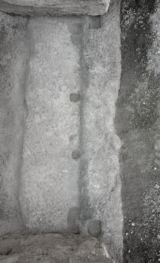 V.1.3 Pompeii. c.2008-10.  
Doorway threshold of room 5 on west side of atrium.
Photo by Hans Thorwid.
Photo courtesy of the Swedish Pompeii Project.