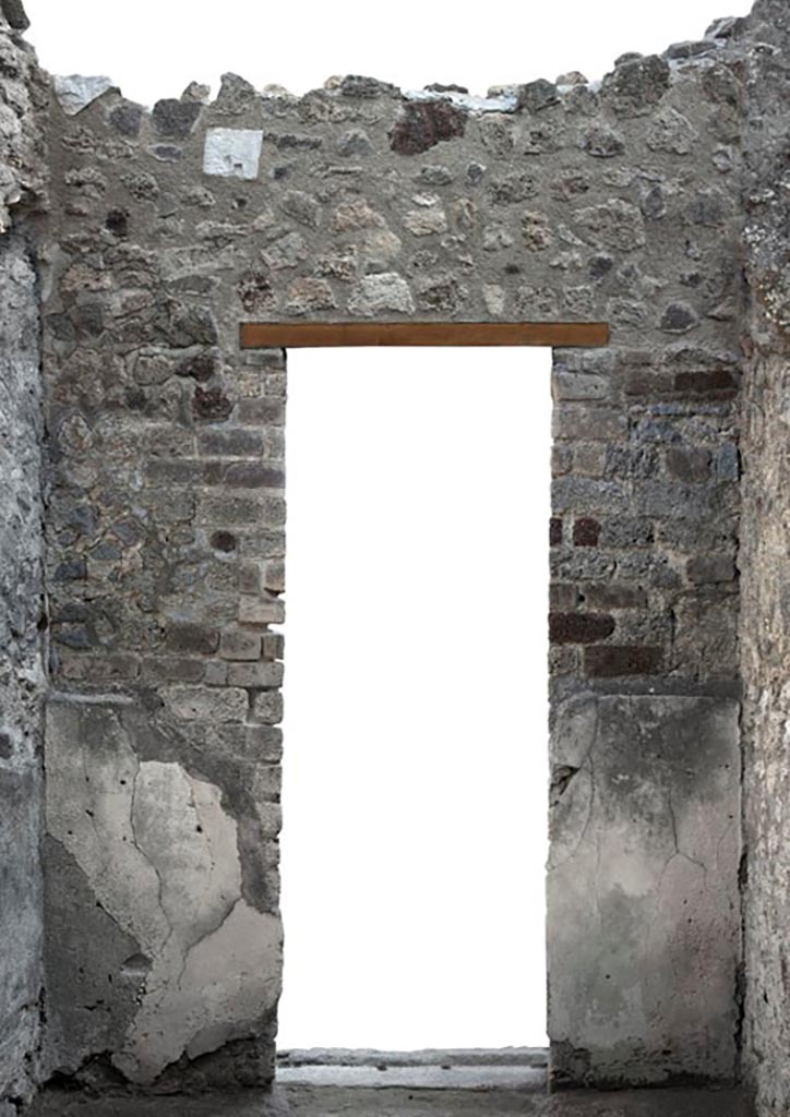V.1.3 Pompeii. c.2012. 
Room 5, east wall with doorway to atrium in north-west corner of room 2 atrium. 
Photo by Hans Thorwid.
“E wall in 2012. Restored parts of the wall photographed and merge with the lower part and floor line of earlier photos from 2005-7.”
Photo and words courtesy of the Swedish Pompeii Project.
