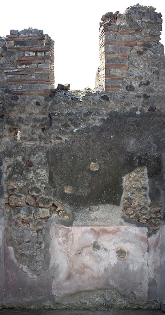 V.1.3 Pompeii. c.2008-10.  
Room 6, west wall, with doorway in upper floor, connecting with V.1.31. 
Photo by Hans Thorwid.
Photo courtesy of the Swedish Pompeii Project.