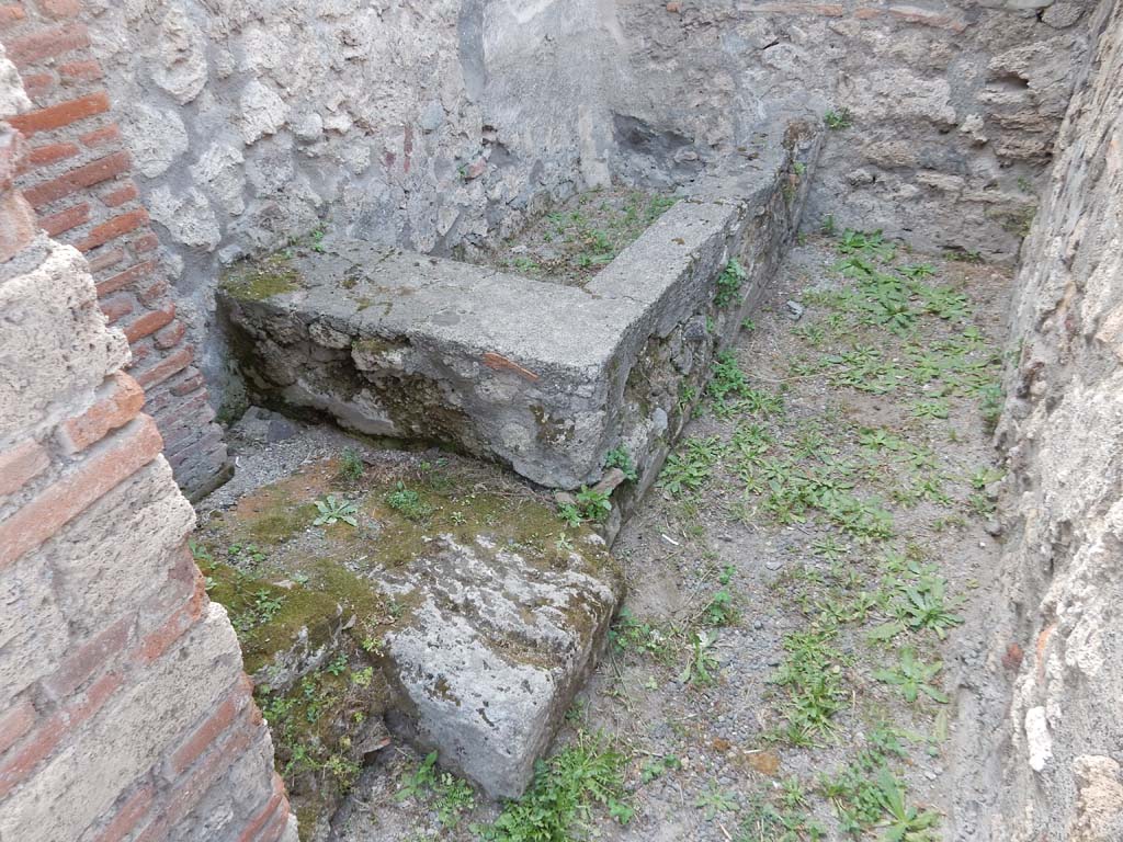 V.1.4 Pompeii. June 2019. Looking towards west side of rear room through doorway. 
Photo courtesy of Buzz Ferebee.