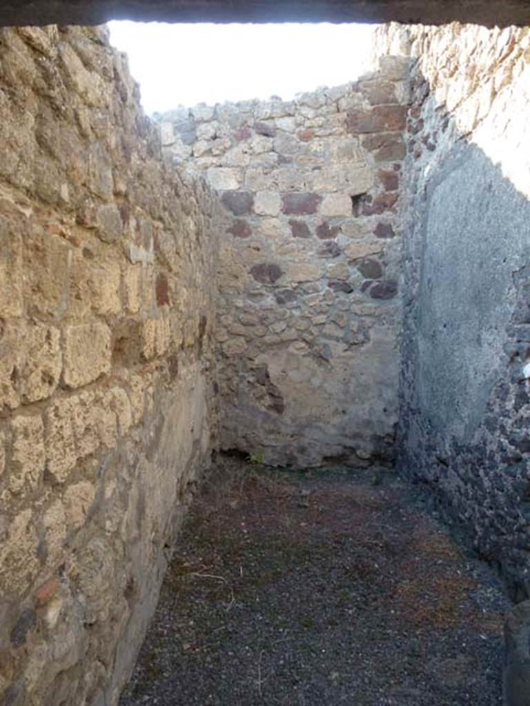 V.1.5 Pompeii. June 2012. Rear room with latrine and steps to upper floor, looking north.
Photo courtesy of Michael Binns.