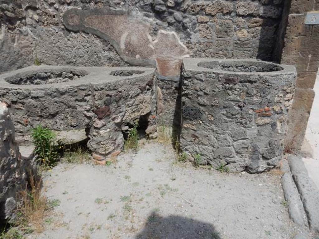 V.1.5 Pompeii. May 2017. Looking towards east wall, with boilers, kettles or vats. 
Photo courtesy of Buzz Ferebee.