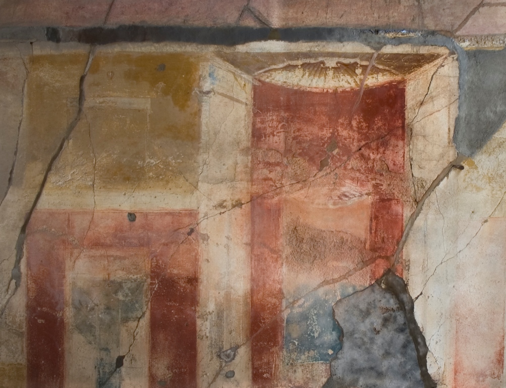V.1.7 Pompeii. c.2005-7.  Room 7, detail of painted decoration in centre of south wall. Photo by Thomas Staub.
Photo courtesy of the Swedish Pompeii Project.