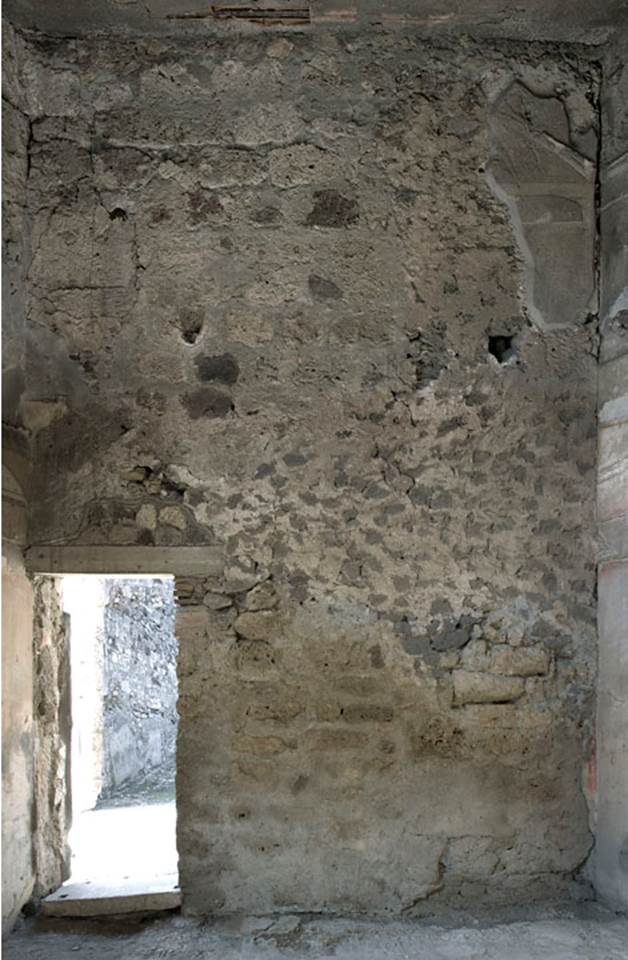 V.1.7 Pompeii. c.2005-7.  
Room 8, north wall with doorway into room 9, east ala. Photo by Hans Thorwid. 
Photo courtesy of the Swedish Pompeii Project.