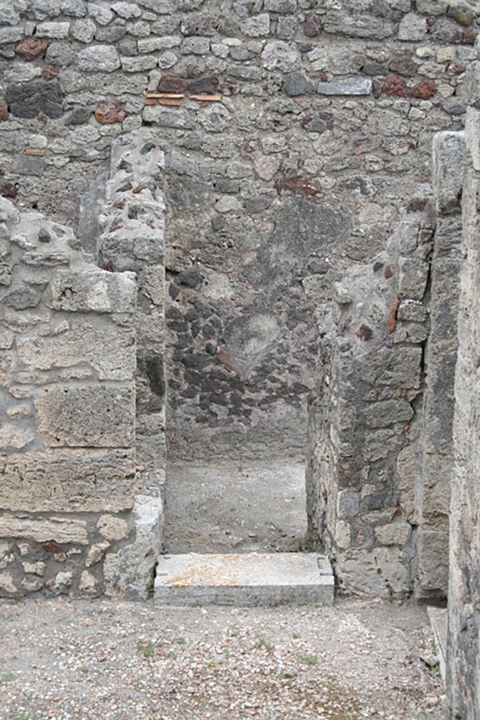 V.1.7 Pompeii. c.2005-7.  
Room “12”, looking towards doorway on east wall in south-east corner of peristyle “b”. Photo by Thomas Staub.
Photo courtesy of Swedish Pompeii Project.