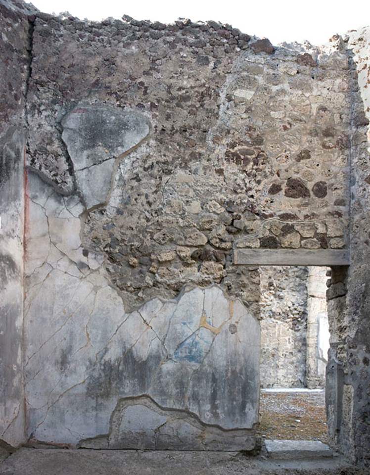 V.1.7 Pompeii. c.2005-7. 
Room 15, north wall with doorway into west ala 14/north-west corner of atrium 4. Photo by Hans Thorwid. 
Photo courtesy of the Swedish Pompeii Project.
