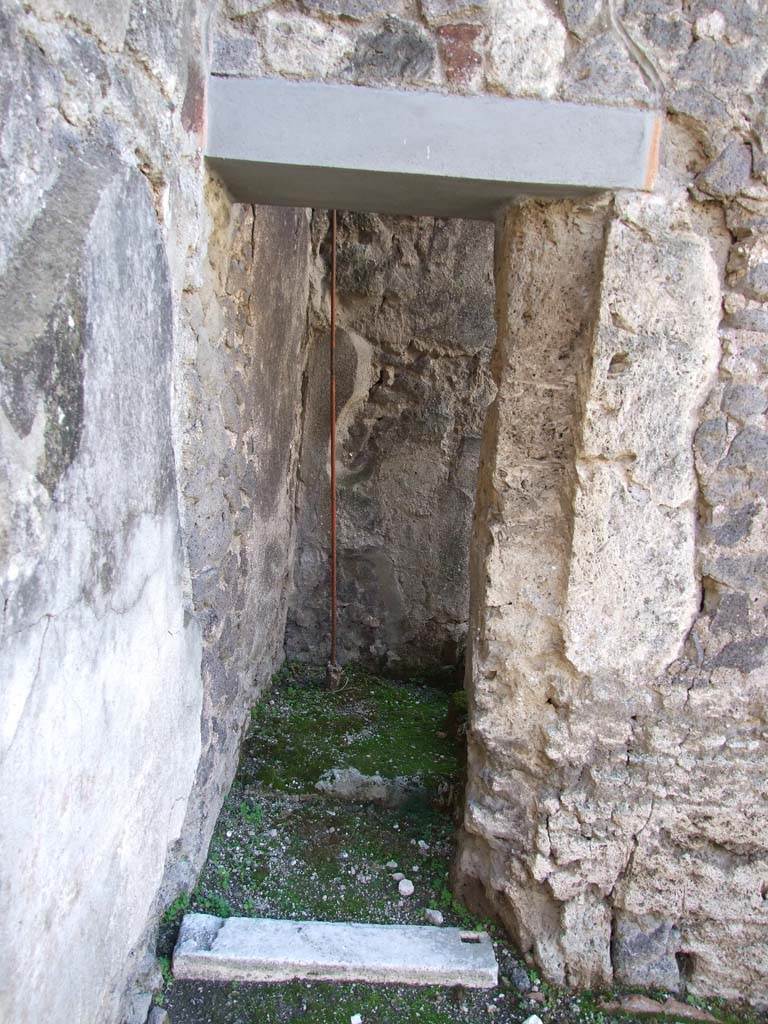 V.1.7 Pompeii. December 2007. Room 2, entrance doorway.