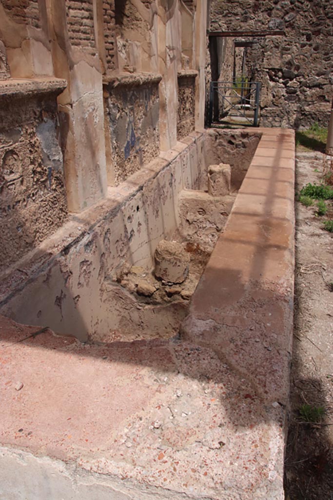 V.1.7 Pompeii. May 2024. 
Room “b”, looking east across water feature from west end. Photo courtesy of Klaus Heese.