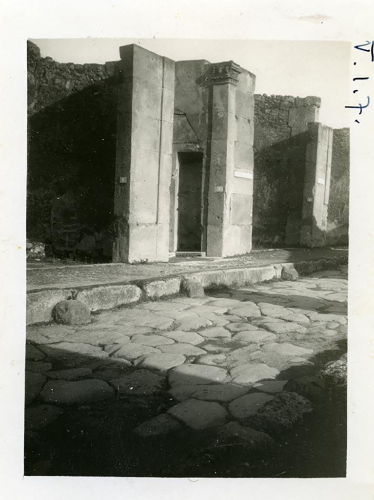 V.1.7 Pompeii. Pre-1937-39. Looking north-east on Via di Nola towards entrance doorway.
On the right side of the main entrance doorway 1, the doorway to small room 2, can be seen.
Photo courtesy of American Academy in Rome, Photographic Archive. Warsher collection no. 1482.