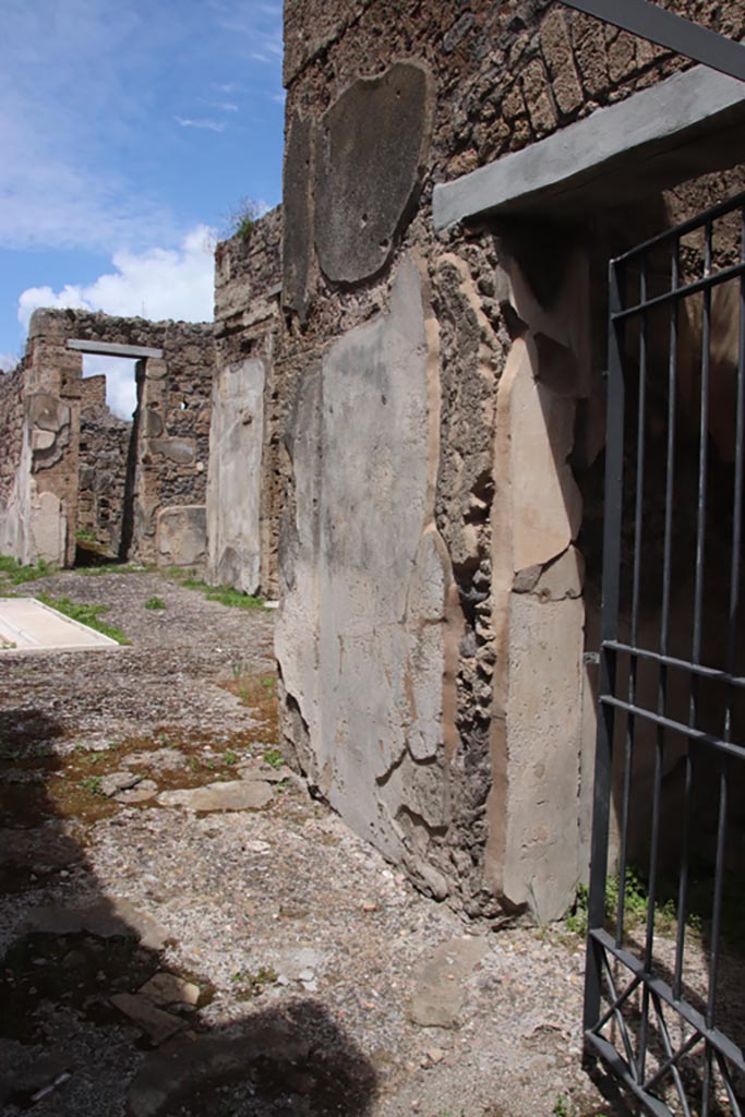 V.1.7 Pompeii. May 2024. 
Looking north along east side of entrance corridor. Photo courtesy of Klaus Heese.