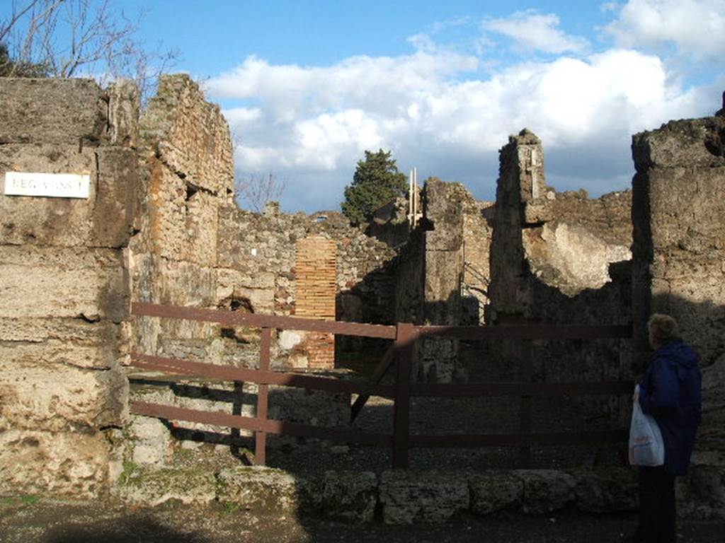 V.I.13 Pompeii. December 2004. Entrance, looking east from Via Stabiana. For description, with plan, 
See - Packer, Jim: Inns at Pompeii: a short survey. In Cronache Pompeiane, IV, 1978, (p.39-43).