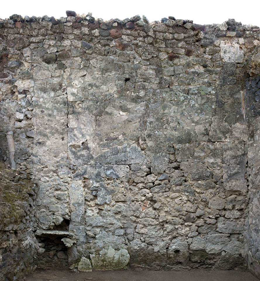 V.1.15 Pompeii. c.2012.  
“South wall of room, with cavity in the wall in the lower east area.” Photo by Hans Thorwid.
Photo and words courtesy of the Swedish Pompeii Project.