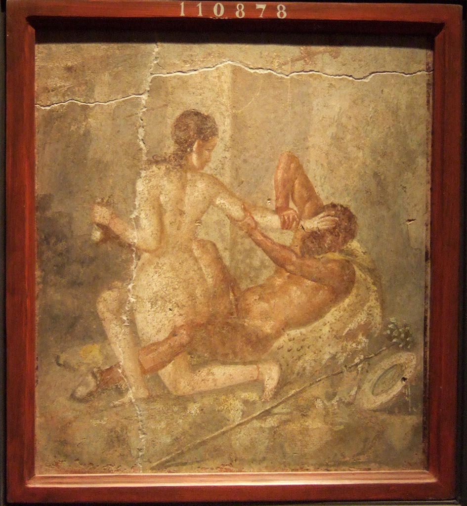 V.1.18 Pompeii. Wall painting of a lying down Satyr and a Bacchante trying to free herself from him, found on the north wall of Room “l” (L).  
Now in Naples Archaeological Museum. Inventory number 110878.