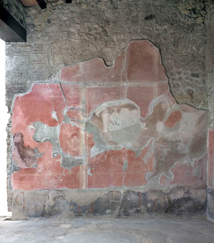 V.1.18 Pompeii. 2012. 
Room “o”, exedra, west wall. Photo by Hans Thorwid.
“West wall in 2012. Lower part and floor line taken in 2012.”
Photo and words courtesy of The Swedish Pompeii Project.