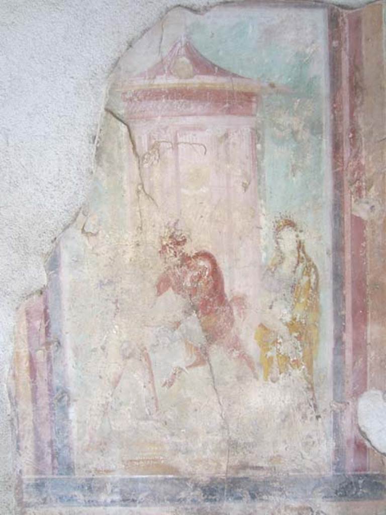 V.1.18 Pompeii. April 2012. 
West wall of exedra “y”, central painting of The Wrestling Contest between Pan and Eros in the presence of Venus.
Photo courtesy of Marina Fuxa.